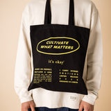 organic tote bag cultivate what matters, screenprinting, black and yellow