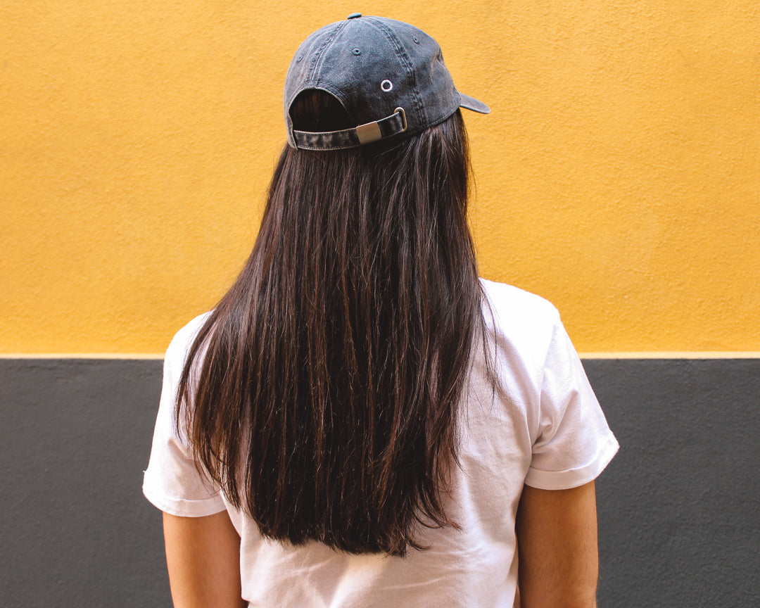 Blueberry cap, 100% cotton, vintage look, embroidered. it's okay to be exactly who you are. From Portugal with love. (Photography: women with long dark hair wearing blueberry cap).  Boné de pala azul de algodão bordado em Portugal.