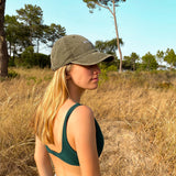Leaf cap, 100% cotton, embroidered, green cap. it's okay to be exactly who you are. From Portugal with love. (Image: blond girl wearing leaf cap in a field)  Boné de pala azul de algodão bordado em Portugal.