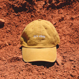 Sunflower cap, yellow cap made with 100% cotton, embroidered. it's okay to be exactly who you are. From Portugal with love. Boné de pala amarelo de algodão bordado em Portugal. Image: Sunflower cap on read sun in the sun.